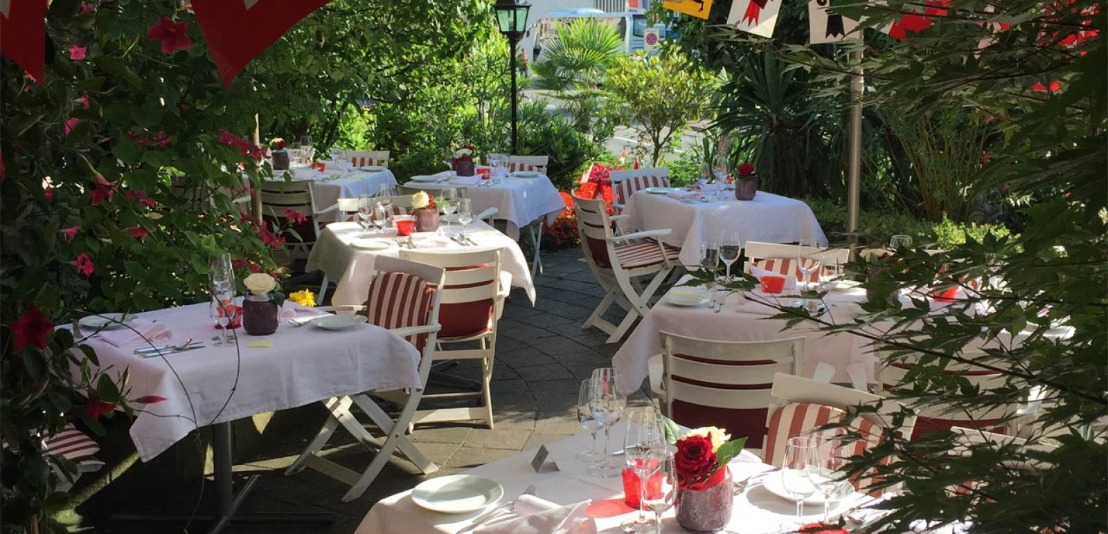 The Mediterranean garden terrace in the restaurant of Hotel Rigi Vitznau.